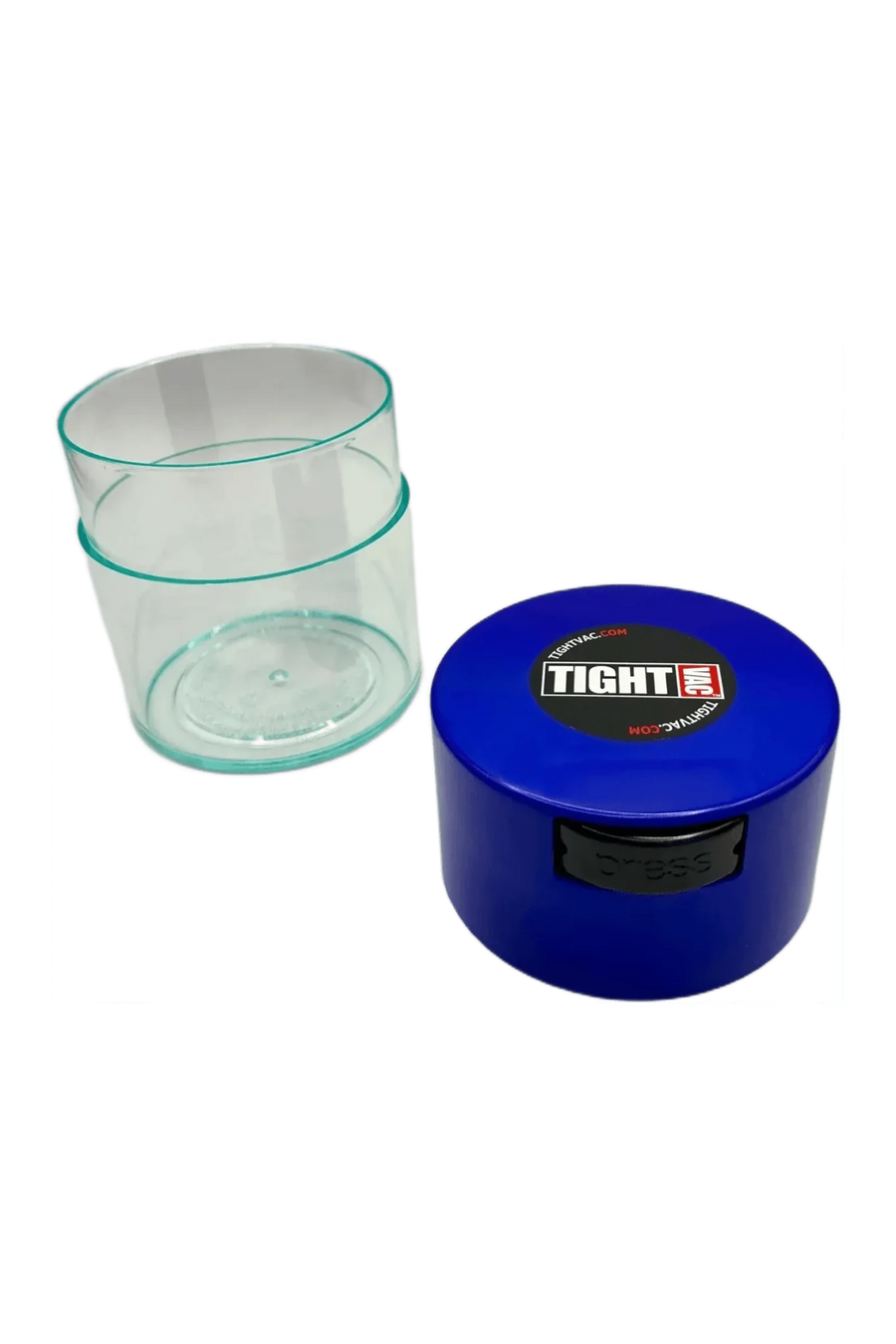 TightVac 0,29 L ouverte, corps transparent à côté d'un couvercle bleu