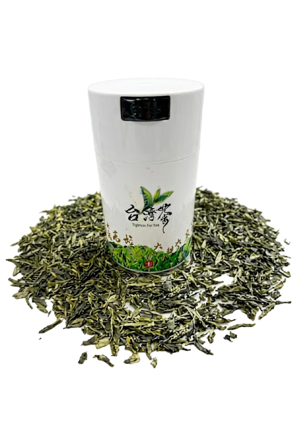 Airtight Tea Storage Container - TeaVac - with green tea surrounding it.