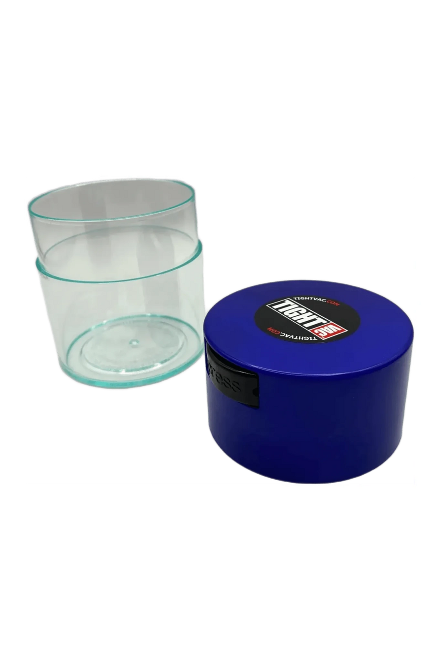 TightVac 0,29 L ouverte, corps transparent de biais à côté d'un couvercle bleu