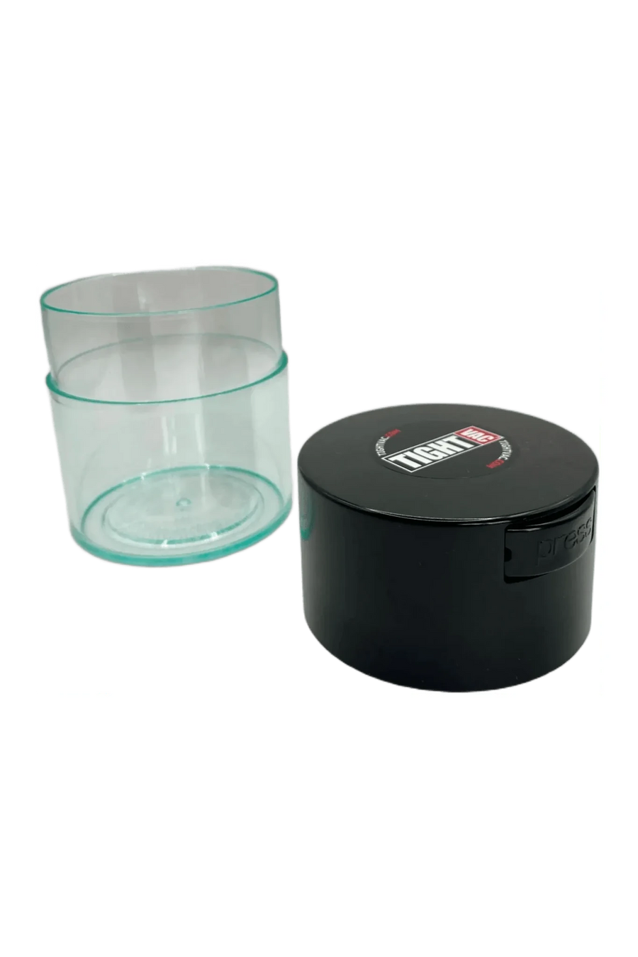 TightVac 0,29 L ouverte, corps transparent à côté d'un couvercle foncé