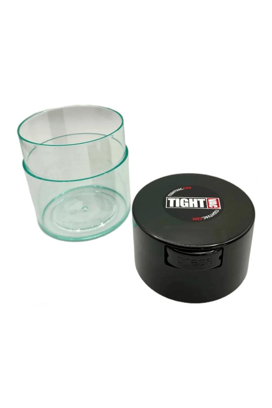 TightVac 0,29 L ouverte, corps transparent à côté de son couvercle foncé